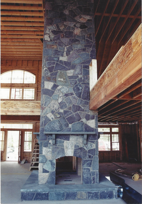 three sided quartzite granite fireplace
